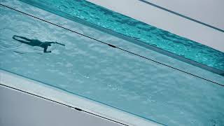 Watch a swimmer in Londons fully transparent Sky Pool [upl. by Anim]