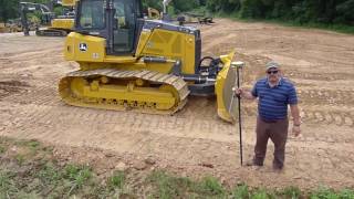 How to set up and operate a bulldozer using GPS blade control [upl. by Ahsiekahs]