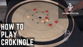 How To Play Crokinole [upl. by Anoirtac439]