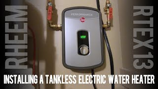 Installing a Tankless Electric Water Heater  Rheem RTEX 240v 13kw in My House [upl. by Engvall233]