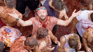 La Tomatina  Festival Discoveries  World Nomads [upl. by Sibeal844]