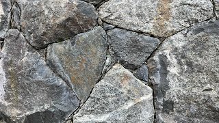 Secrets to creating a beautiful NATURAL STONE WALL Insights from a real stonemason [upl. by Attwood226]