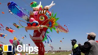 China’s annual kite festival takes off with 280metrelong ‘dragon’ in the sky [upl. by Eluj]