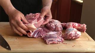 How to Break Down a BoneIn Pork Shoulder [upl. by Thissa]