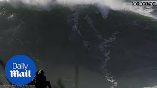 Surfer gets wiped out by a gnarly 60 FOOT WAVE [upl. by Gefen118]