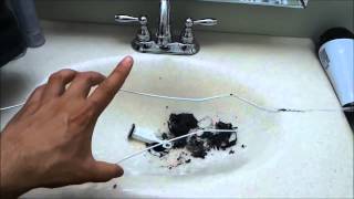 How To Unclog A Bathroom Sink Cleaning The Stopper [upl. by Wolliw47]